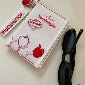 Origins Youthtopia Red and White Passport Holder